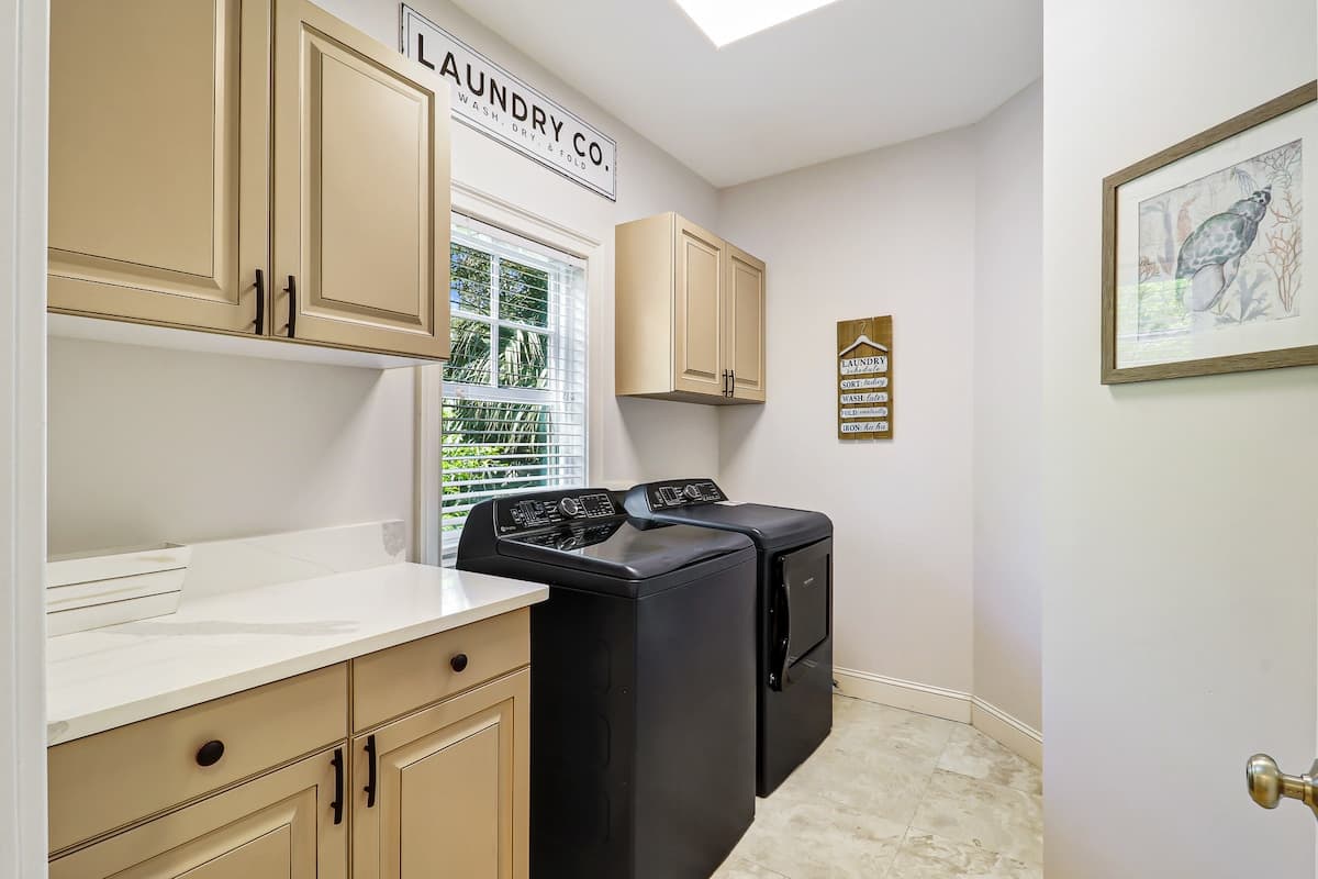 Convenient laundry room located mid-level