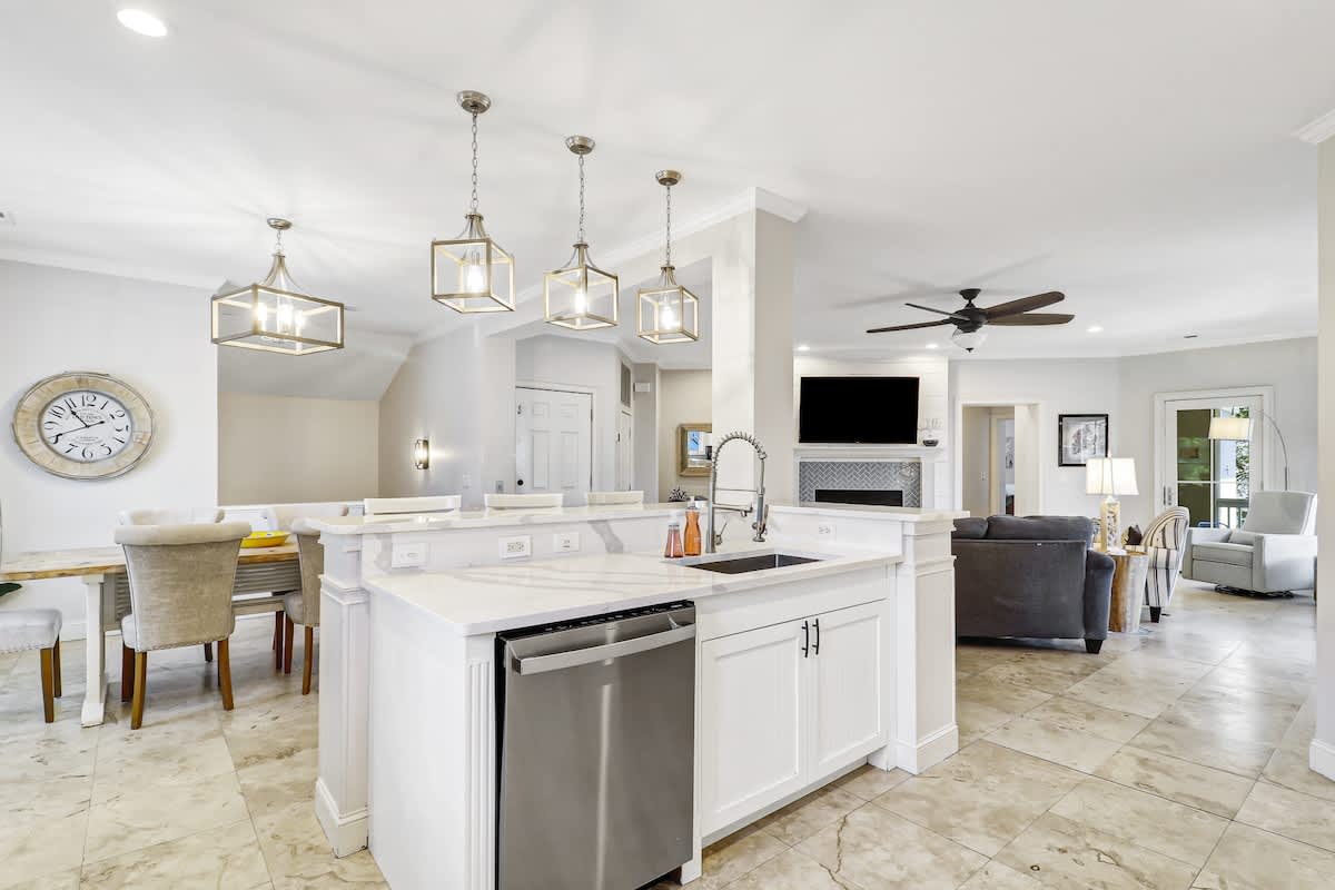 Unwind in this bright, open-concept space where your gourmet kitchen flows seamlessly into the living area, perfect for cooking and entertaining.