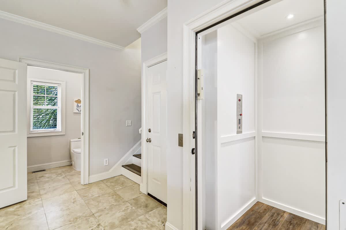 Your private elevator awaits, offering effortless access to your retreat with modern convenience and style.