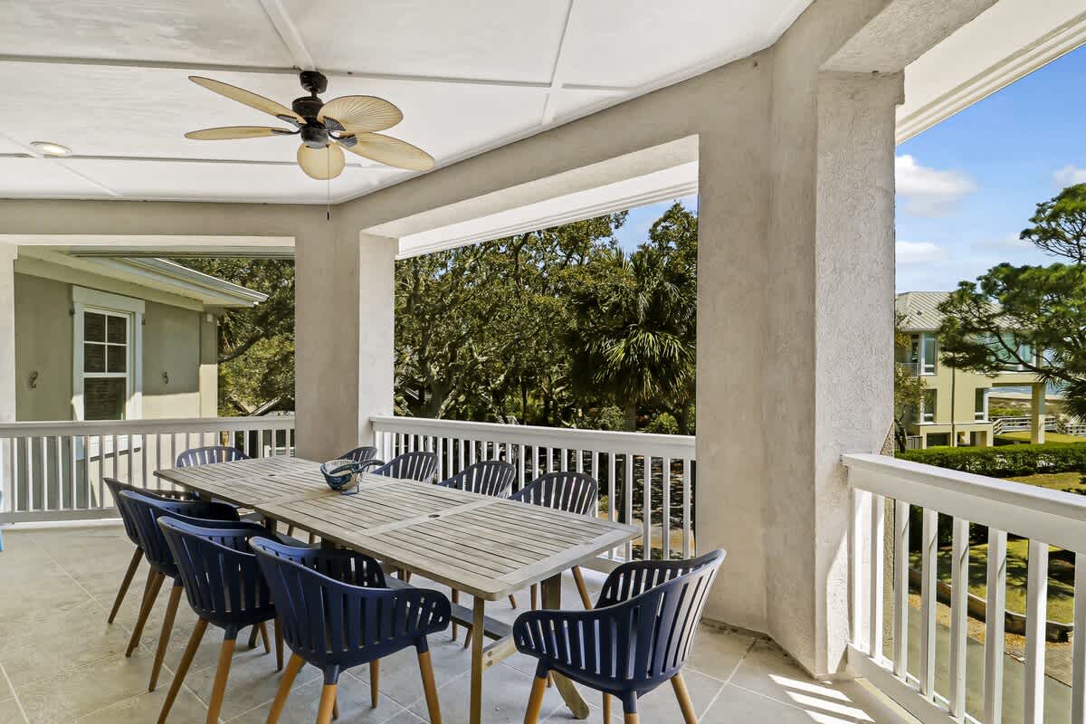 Savor meals on your private covered terrace with comfortable seating for eight and peaceful garden views.