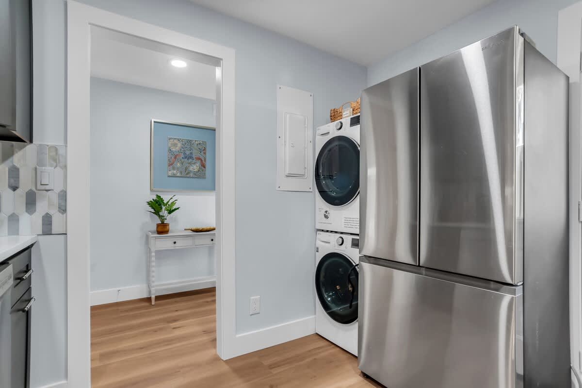 Your modern kitchen nook features stainless steel appliances and convenient in-unit washer and dryer for effortless laundry during your stay.