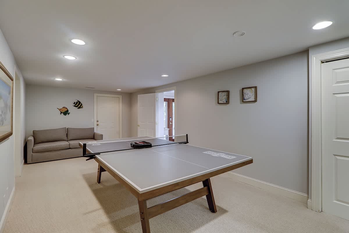 Lower Level Ping Pong Table with Sleeper Sofa