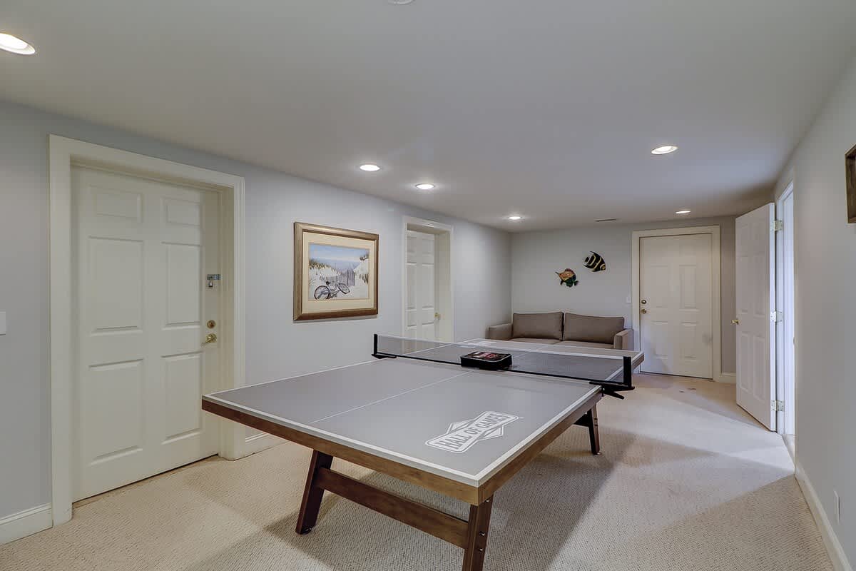 Lower Level Ping Pong Table with Sleeper Sofa