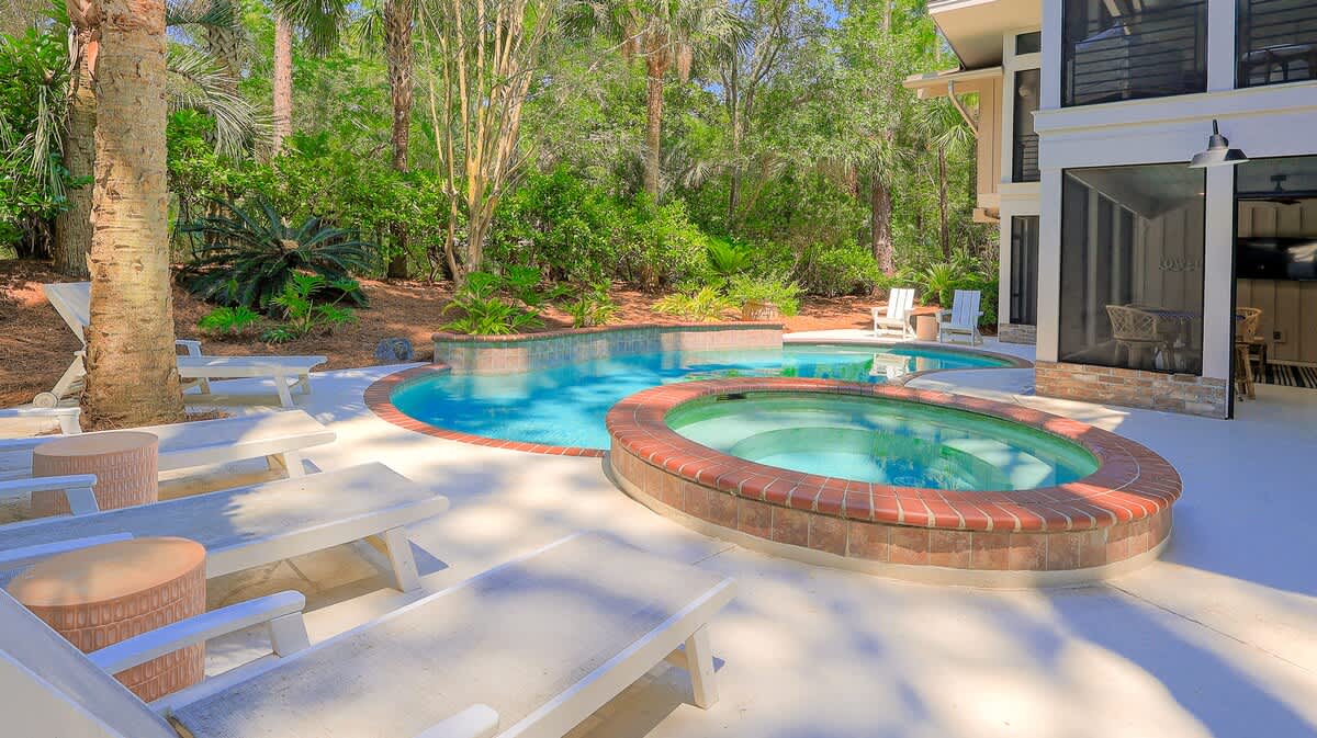 Pool Area with Outdoor Shower and Beach Path