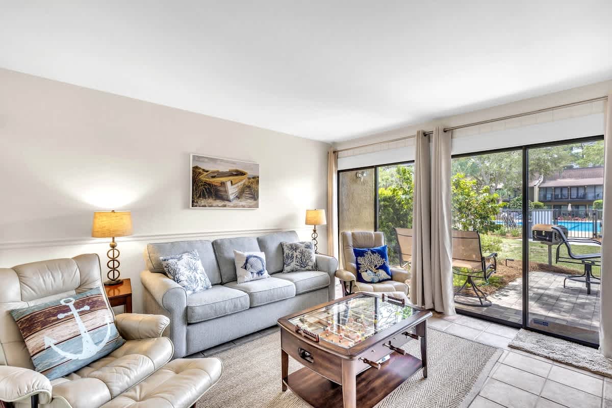 Lower-Level Living Area with Access to Private Patio and Beach Path