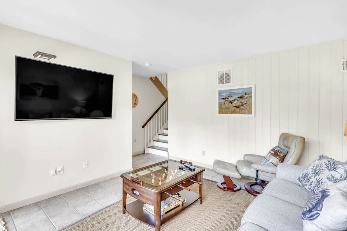 Lower-Level Living Area with Access to Private Patio and Beach Path
