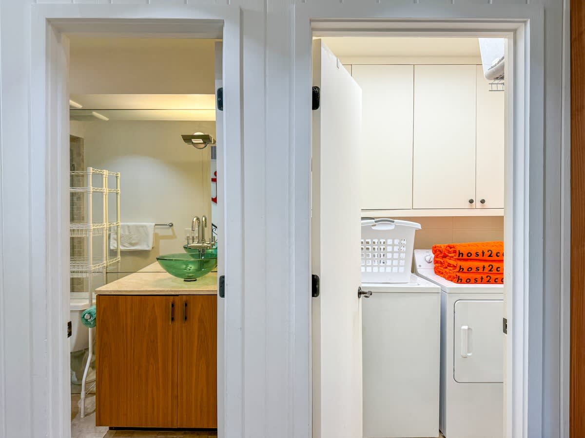 Full Guest Bathroom and Laundry Room at Entrance
