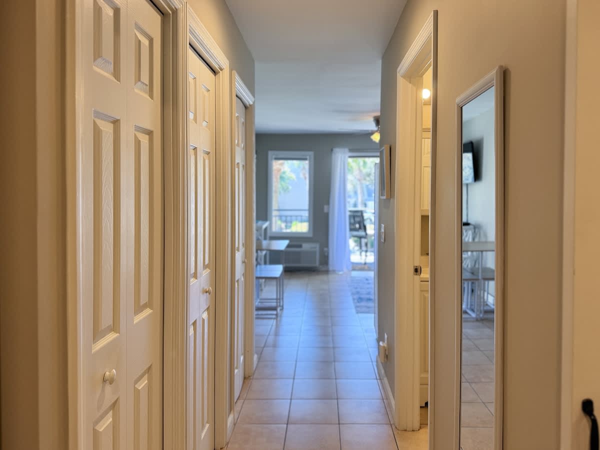 Hall with Guest Closets, Bathroom and Living Area
