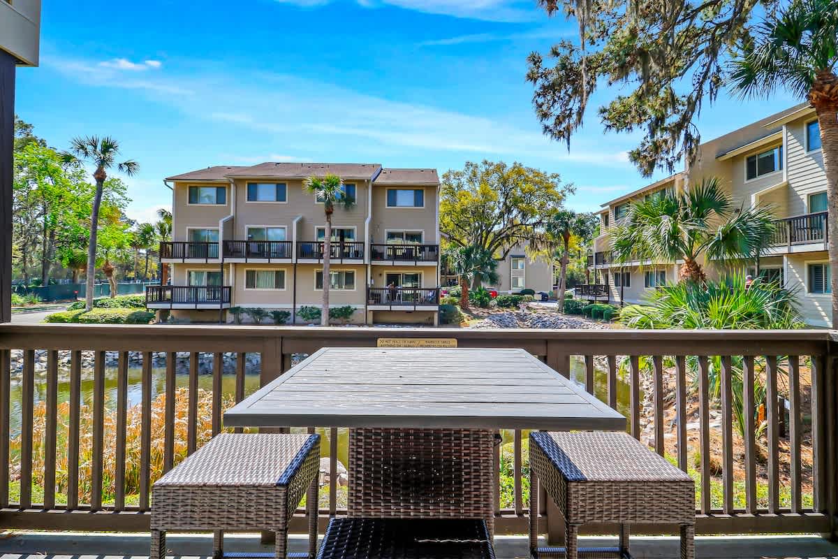 Your private balcony offers the perfect spot to enjoy morning coffee or evening drinks while taking in tropical courtyard views.