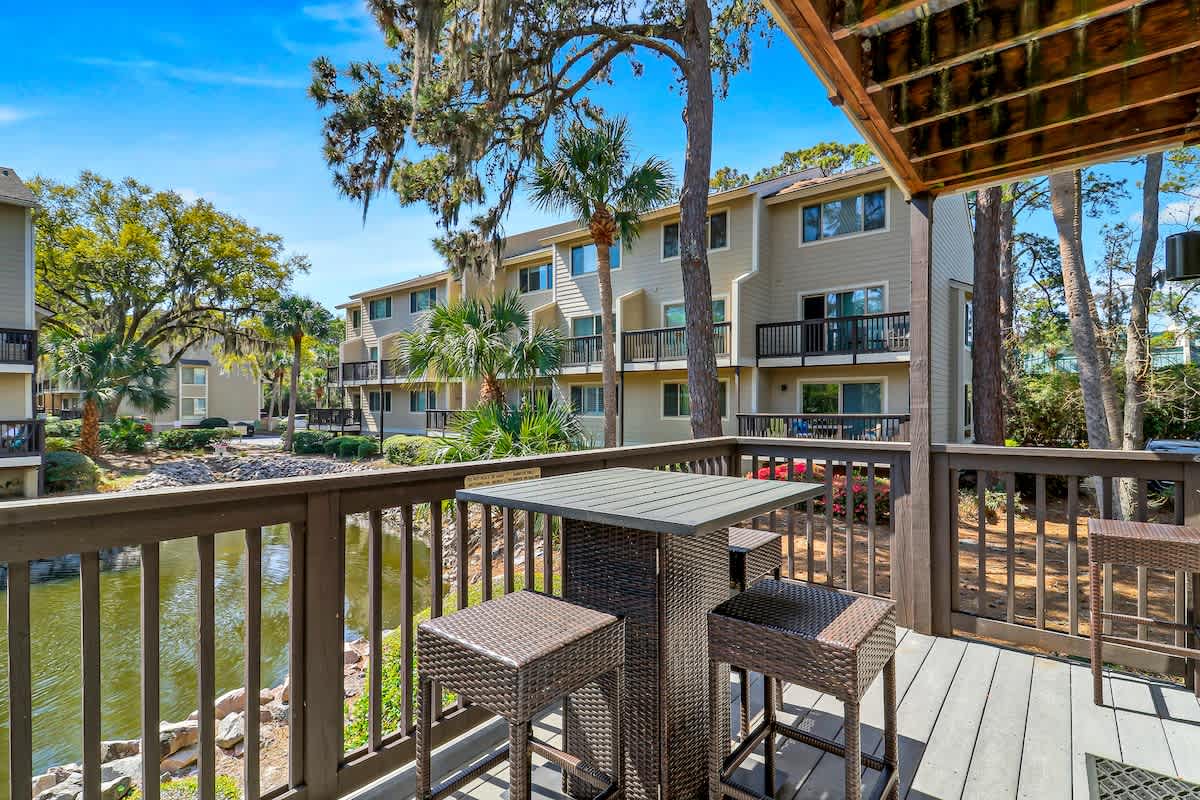 Your private balcony offers peaceful water views, perfect for morning coffee or evening relaxation overlooking the landscaped grounds.