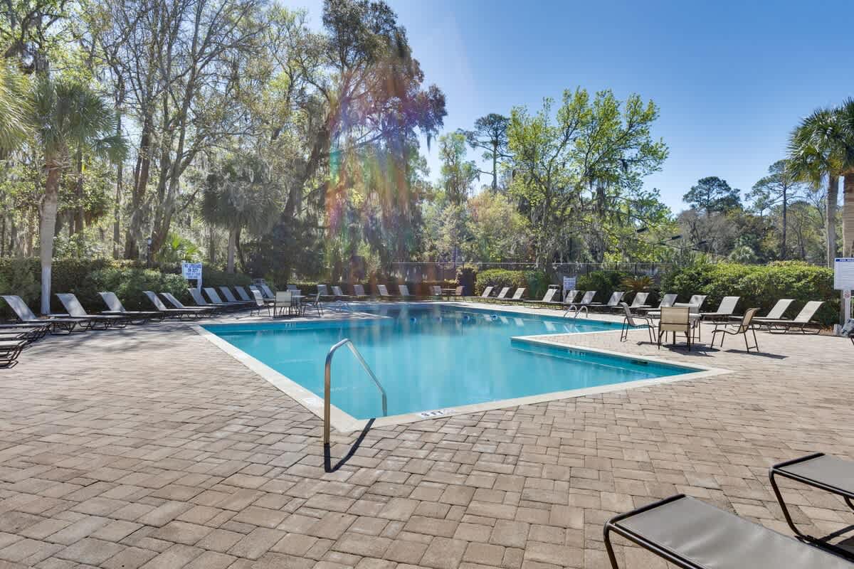 Dive into crystal-clear waters surrounded by lush tropical landscaping. Plenty of loungers await your perfect poolside afternoon.