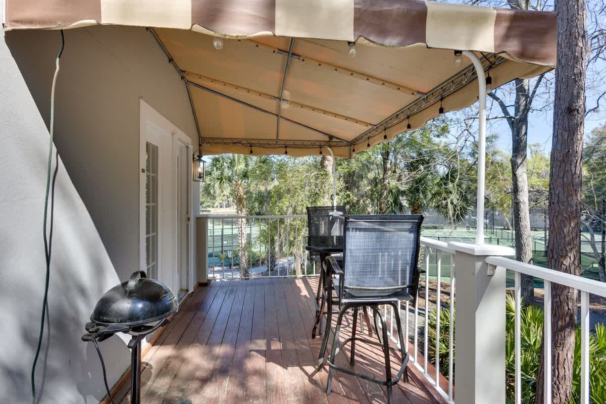 Your private covered deck offers shaded dining and BBQ space with peaceful garden views for memorable outdoor meals.