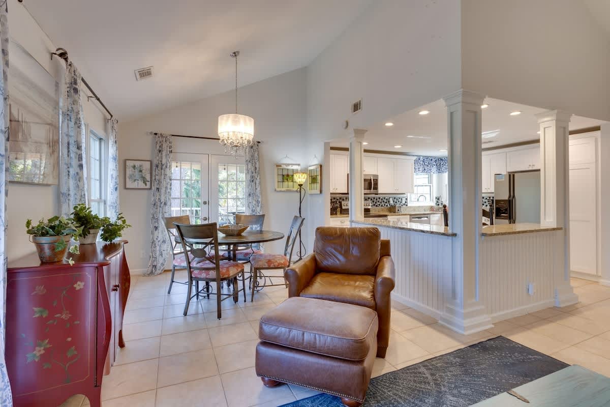 Relax in your open living space where leather seating meets elegant dining, all flowing seamlessly to your fully-equipped kitchen.