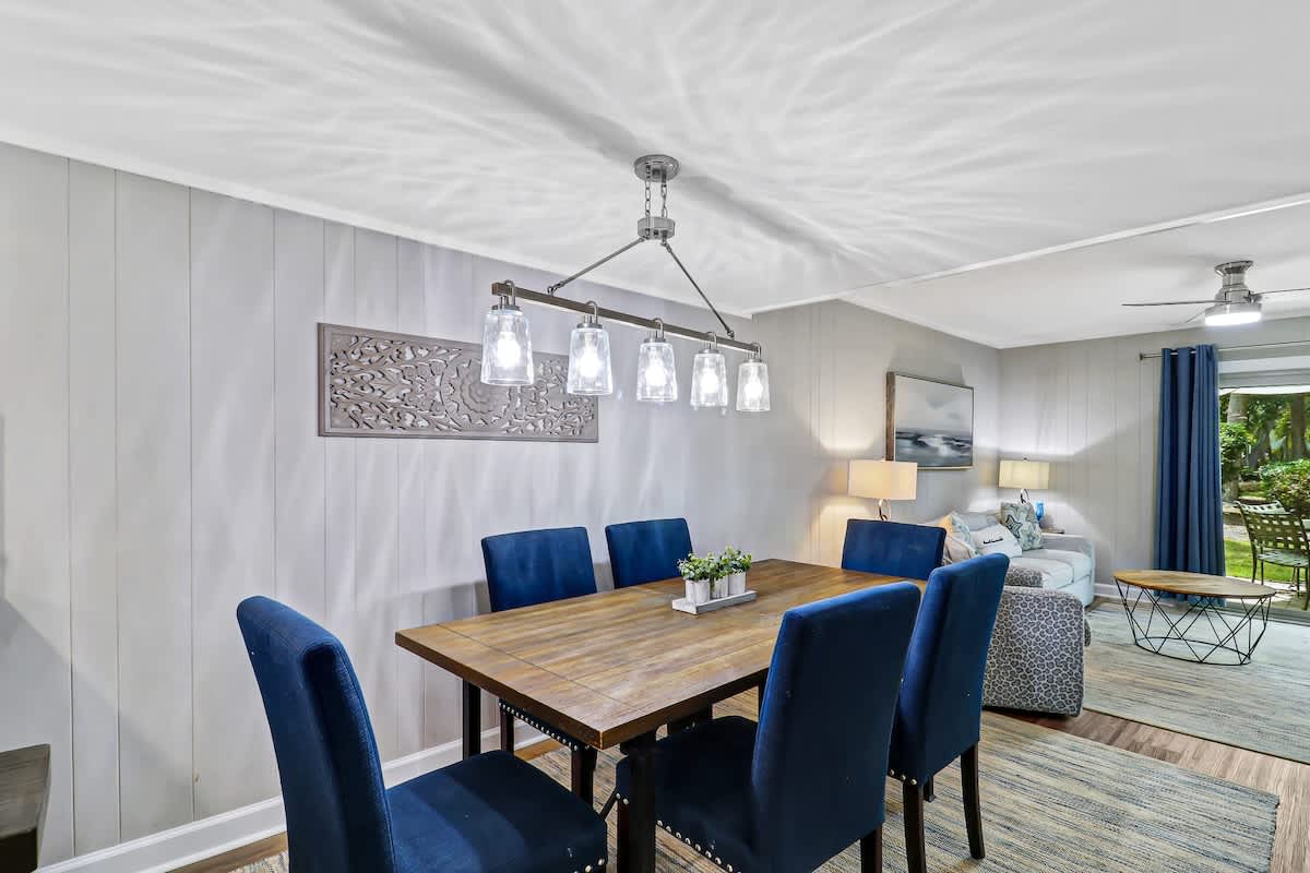 Gather around this dining table where memories are made over shared meals and conversations.