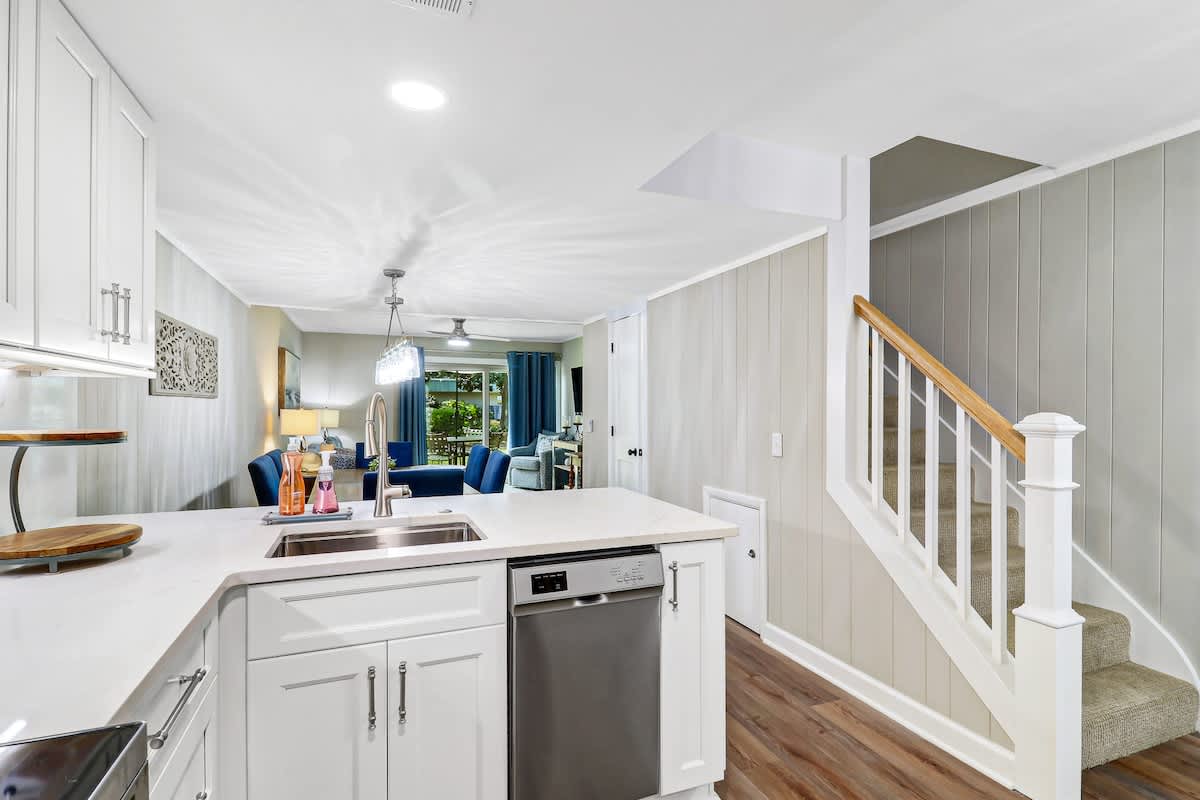 Your spacious open-plan kitchen flows seamlessly into the living area, perfect for preparing meals while staying connected with family and friends.