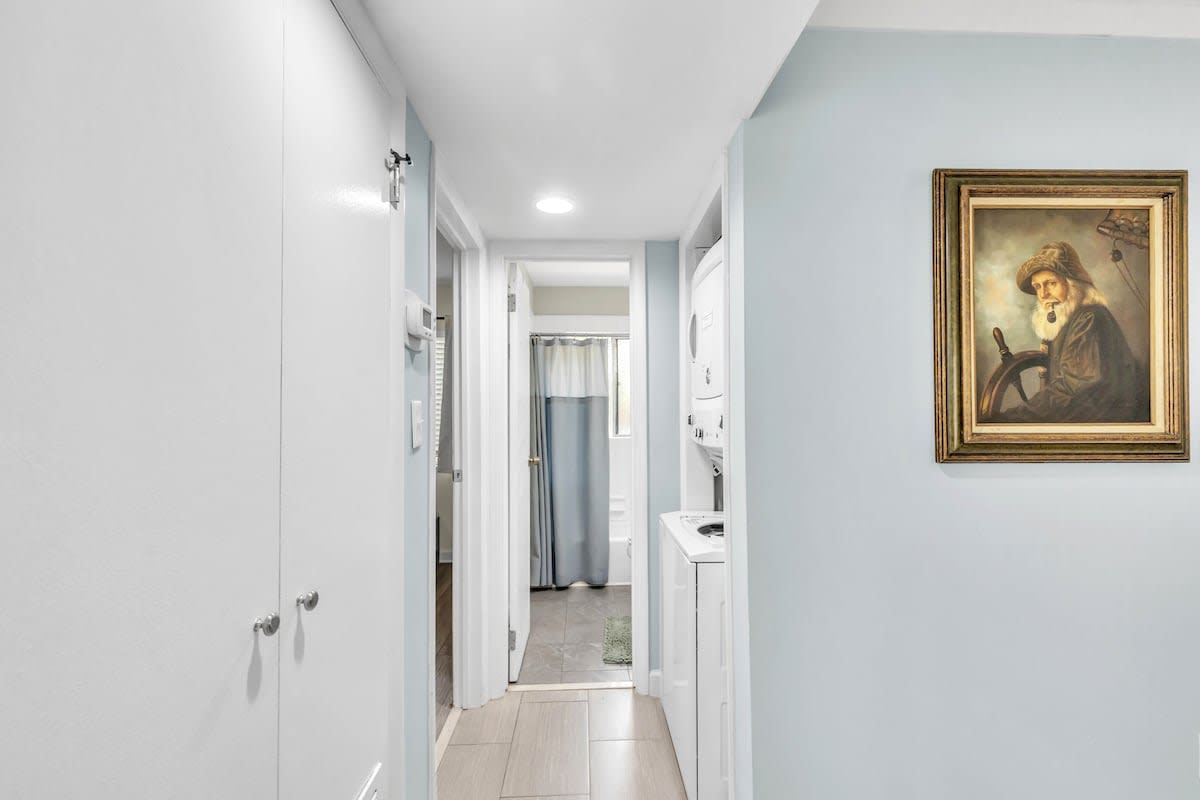 Hallway to Bathroom, Laundry Closet, and Guest Bedroom