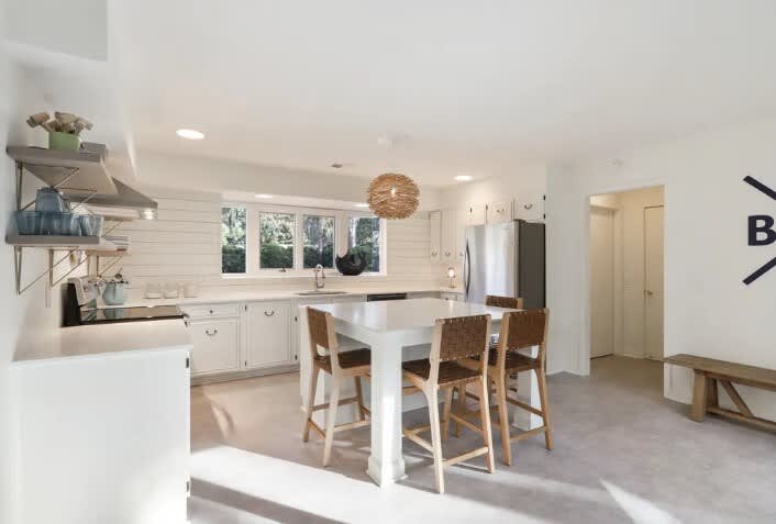 Fully equipped with ample counter space and island seating