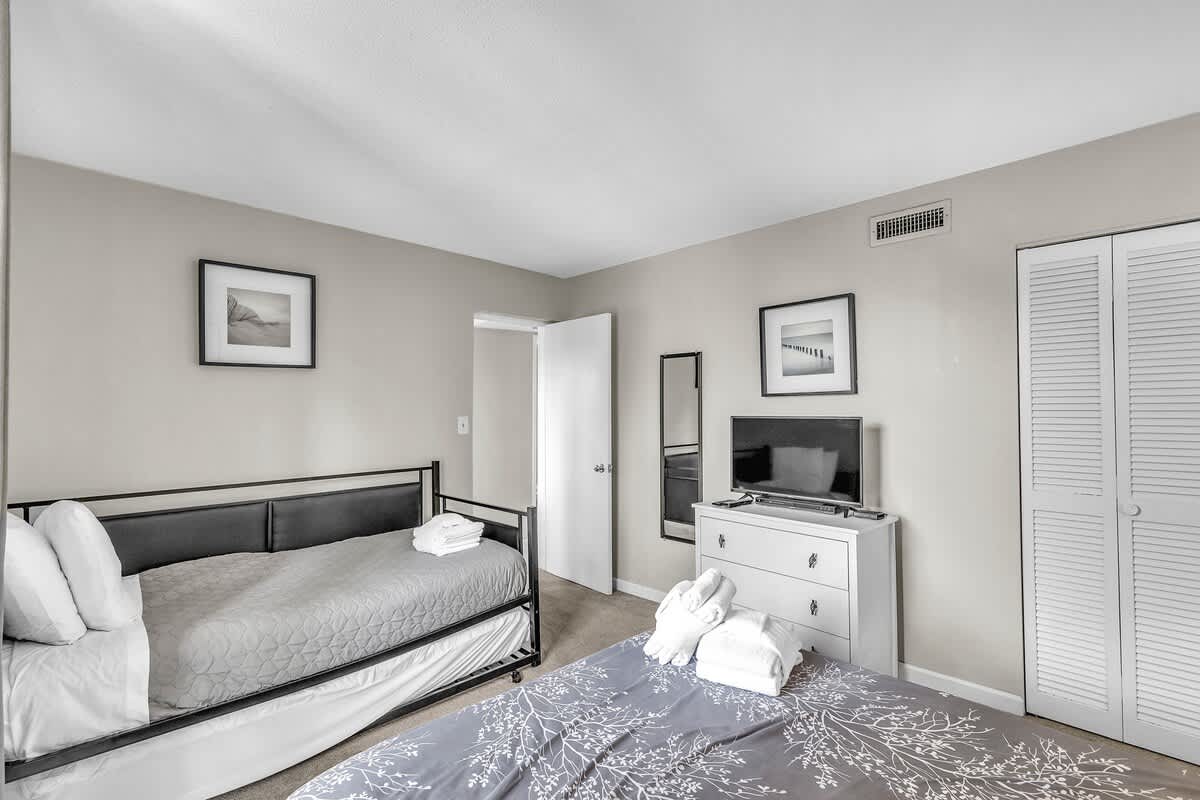 Guest Bedroom with Queen Bed and Trundle Daybed
