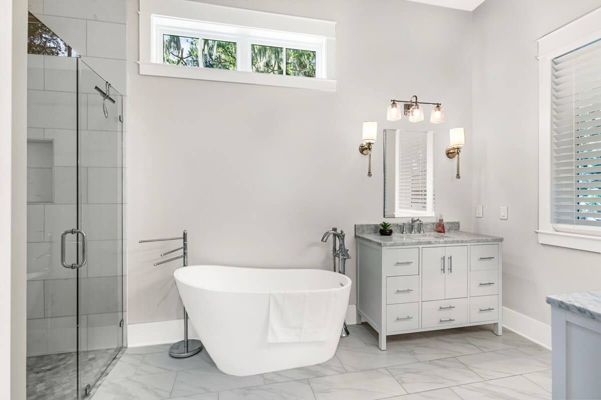 Primary En-Suite Bathroom with Soaking Tub, Dual Vanities, and Walk-In Shower