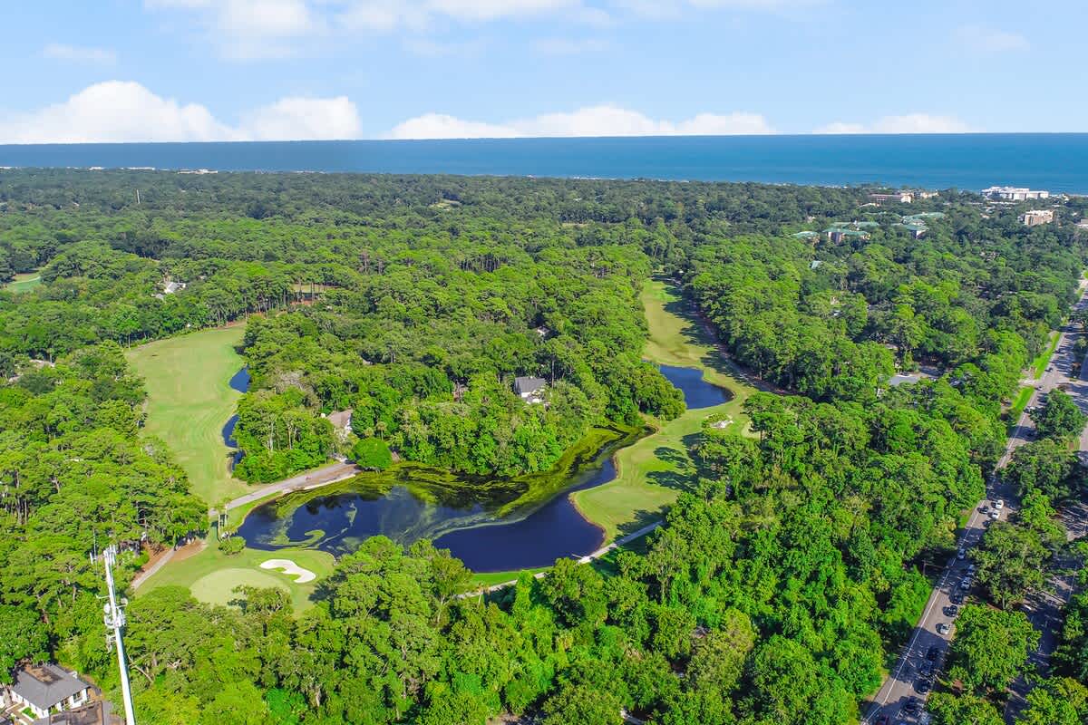 Aerial Above Home Overlooking Golf Course