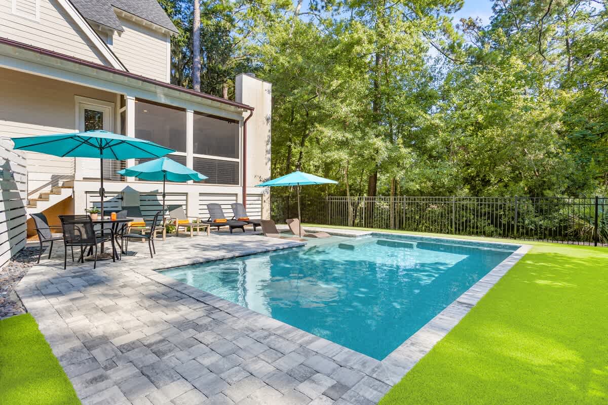 Private Pool with Secure Fenced Yard and Lush Astroturf