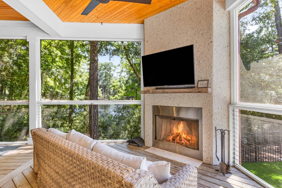 Screened Wraparound Porch with Views of Lagoon, Private Pool, and Glimpses of Golf Course