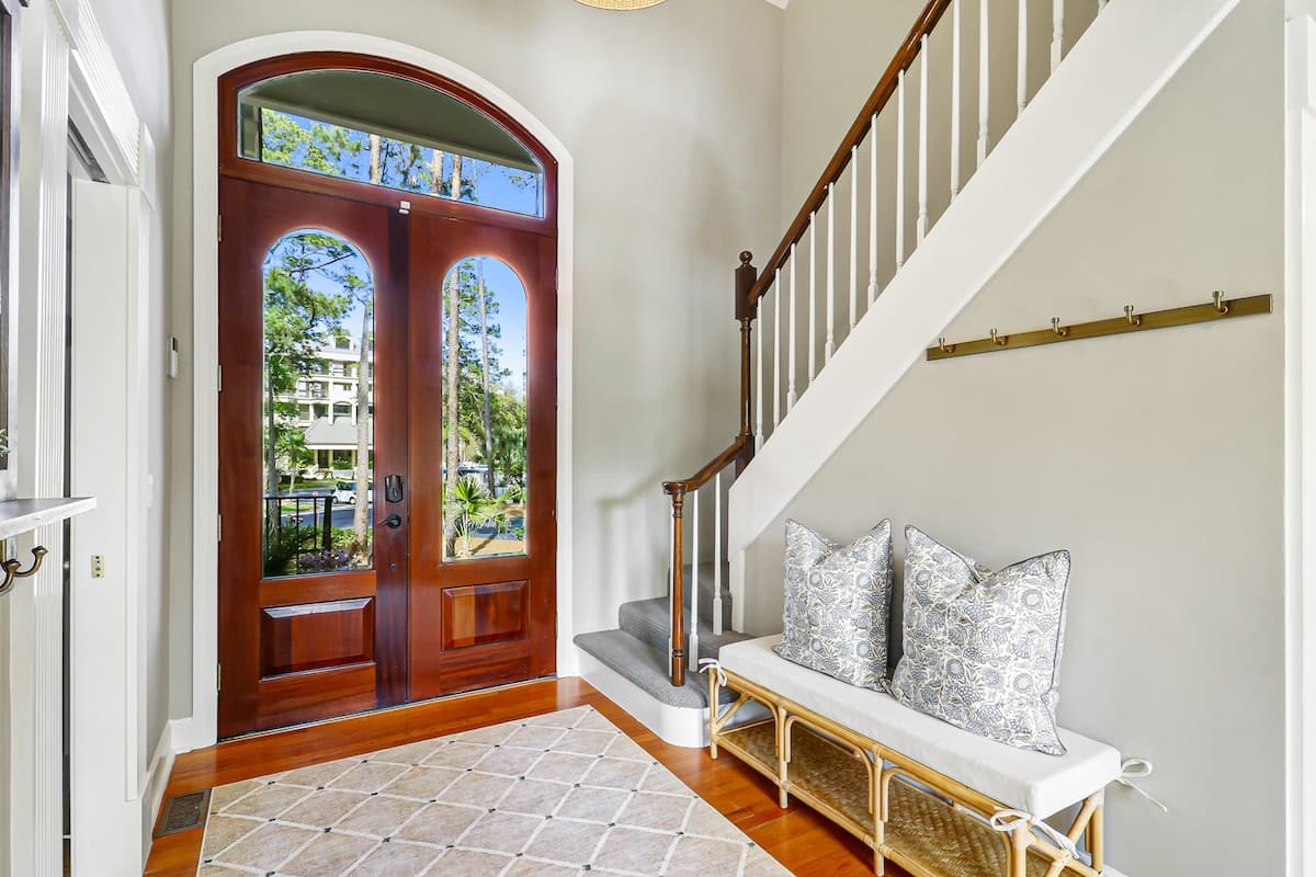 Welcoming entryway with charming coastal touches, setting the tone for a warm and inviting stay from the moment you arrive.