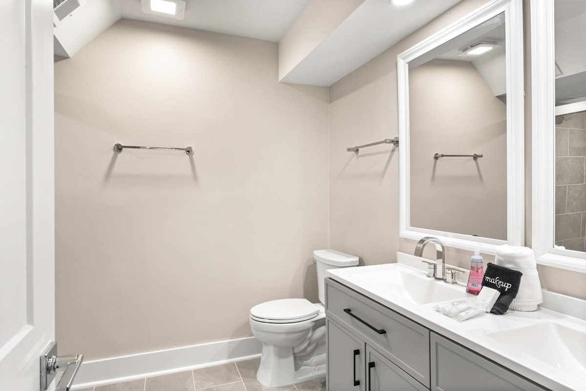 Your private bathroom features modern vanity, fresh towels, and thoughtful amenities for your comfort.