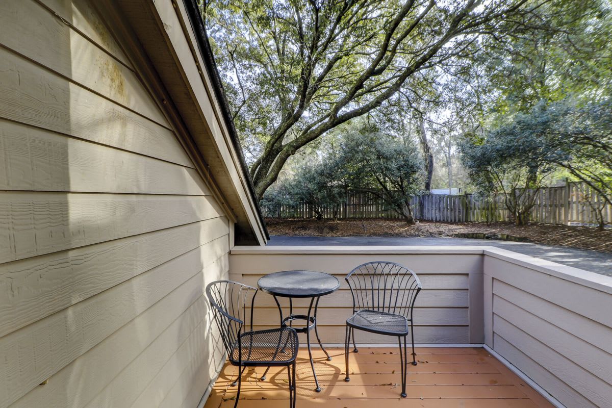 Front patio with table and chairs make for perfect outdoor dining.