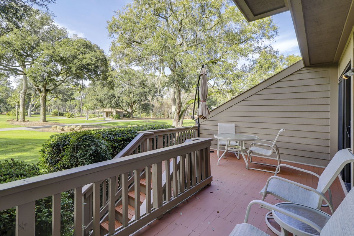 Back patio with beautiful views of Harbour Town Golf Links. Spacious and several tables and chairs make for perfect outdoor dining.
