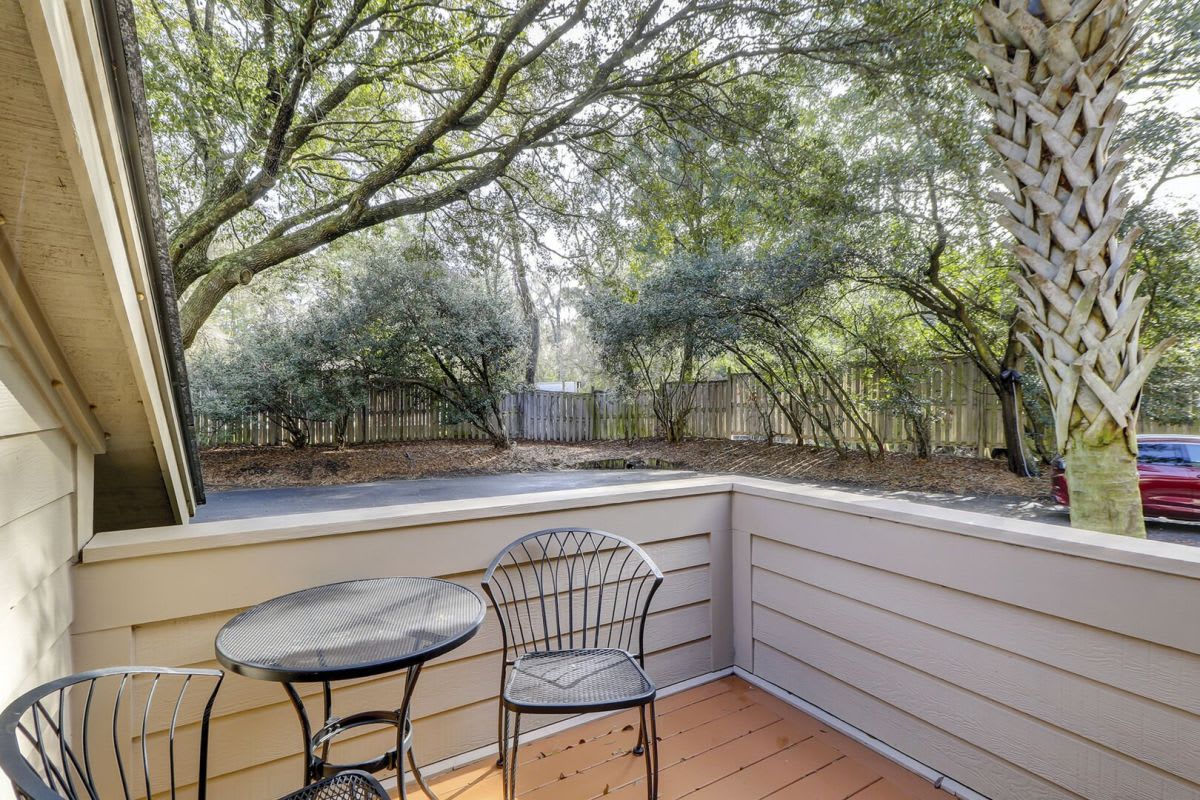 Front patio with table and chairs make for perfect outdoor dining.