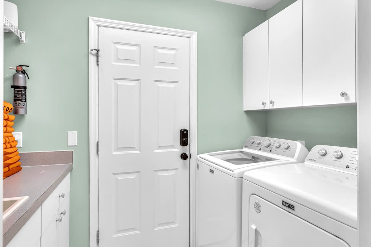 Your dedicated laundry space features full-size washer and dryer with plenty of storage for all your vacation essentials.