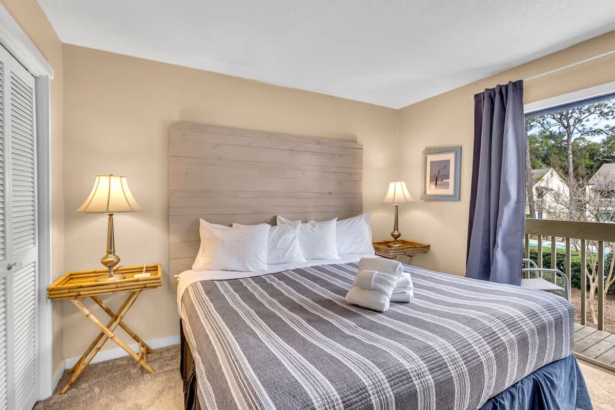 Sink into plush bedding while gentle morning light filters through windows, creating the perfect sanctuary for rest.