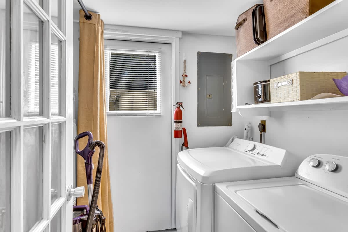 Your convenient laundry room with washer and dryer keeps you feeling fresh throughout your stay.