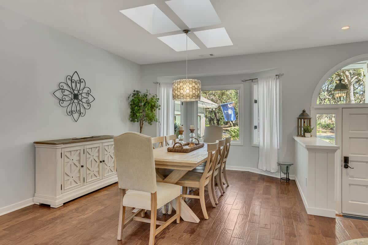 Your elegant dining room features natural light streaming through skylights, perfect for memorable meals with loved ones.