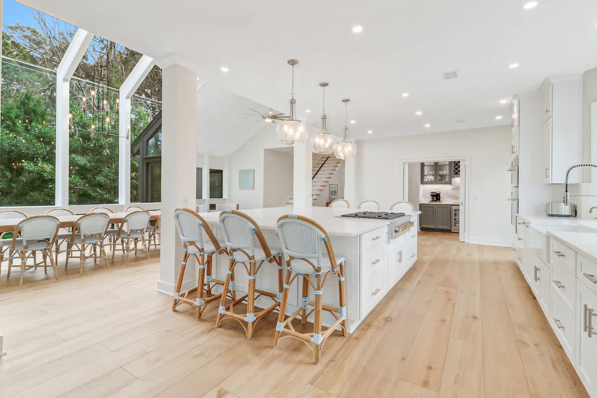 Your gourmet kitchen awaits with spacious marble counters, top-tier appliances, and bistro-style seating perfect for morning coffee or entertaining friends.