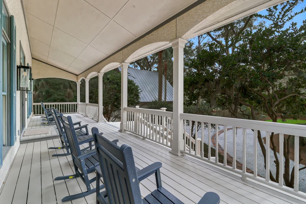 Relax on your spacious wraparound porch with comfortable rocking chairs, perfect for morning coffee and evening conversations.