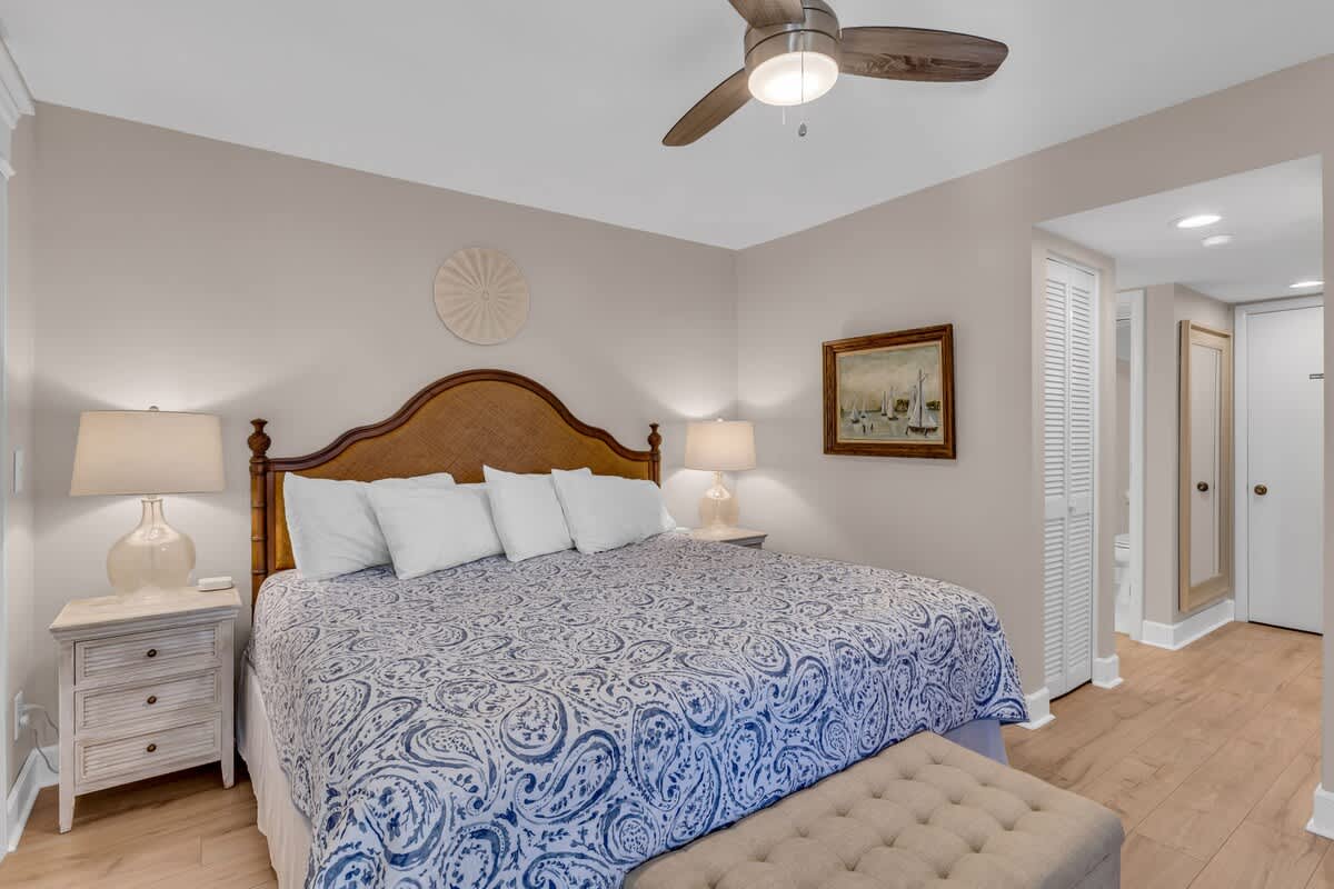 Drift off peacefully in your elegant master bedroom, complete with plush linens and gentle ceiling fan keeping you comfortable all night.