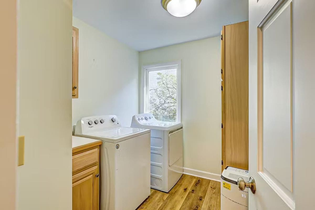You'll appreciate the convenient in-home laundry facilities, complete with washer and dryer in this bright, well-organized space.