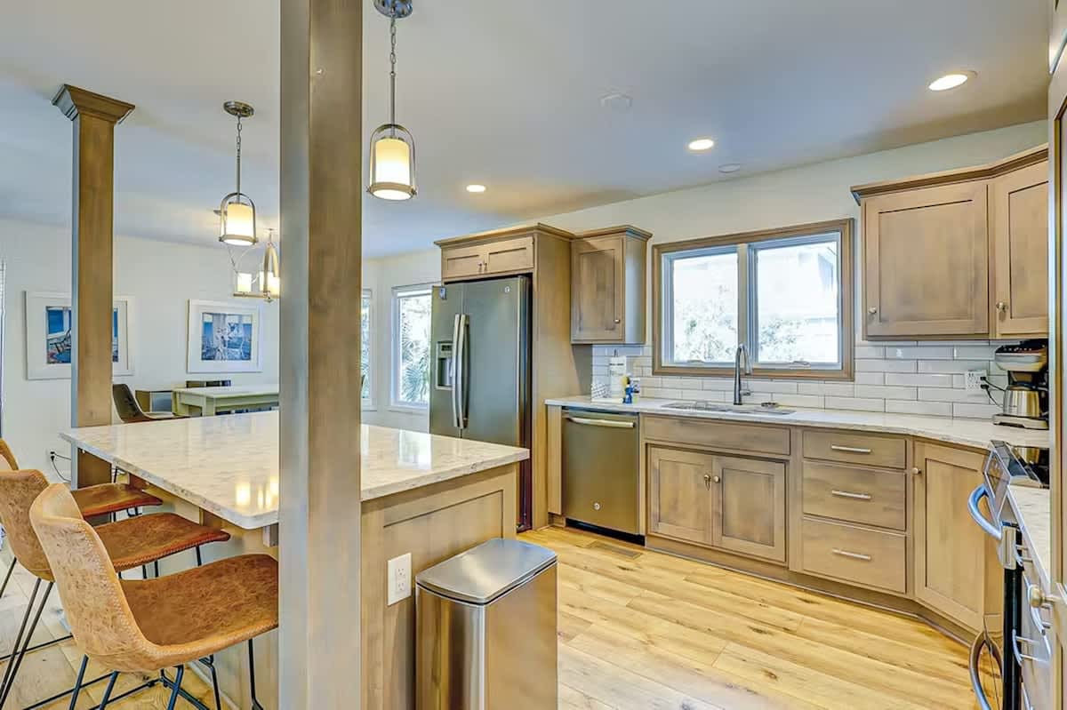Your spacious kitchen flows seamlessly into the dining area, creating the perfect space for cooking memorable meals together.