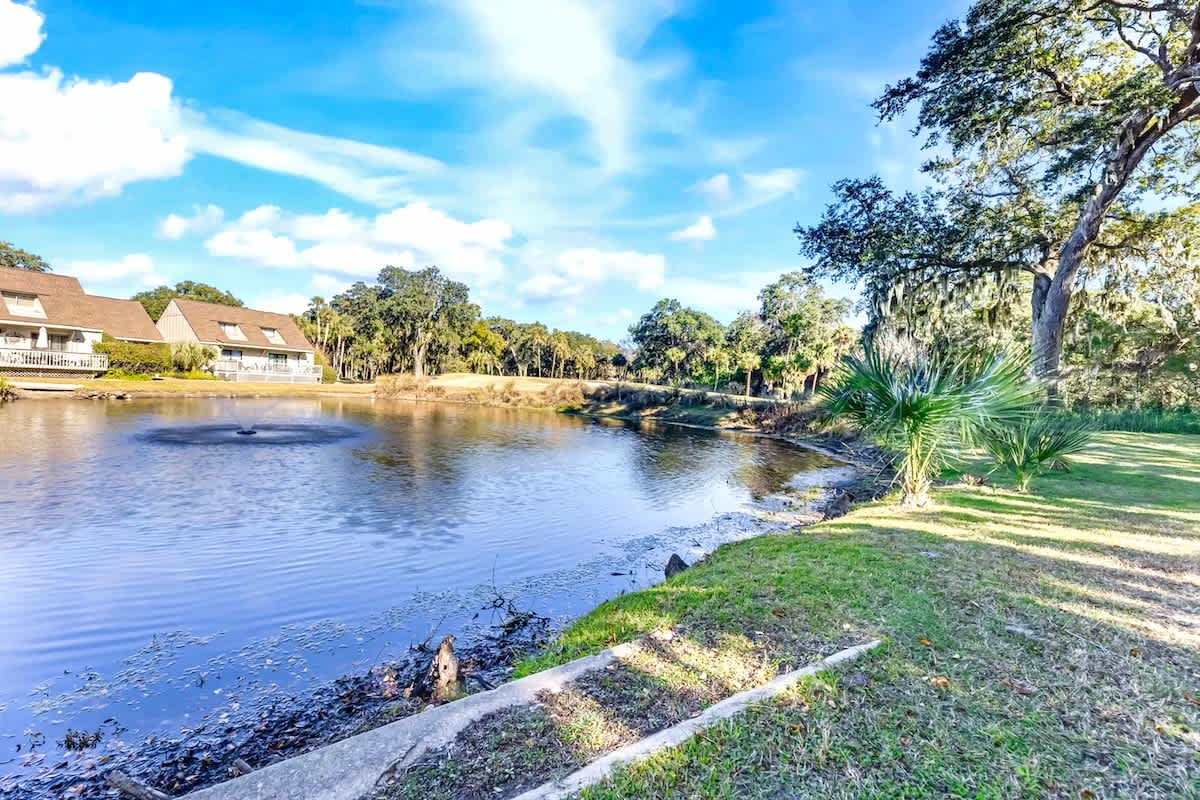 Waterfront property with serene lagoon views, lush landscaping, and peaceful natural surroundings for a tranquil getaway.