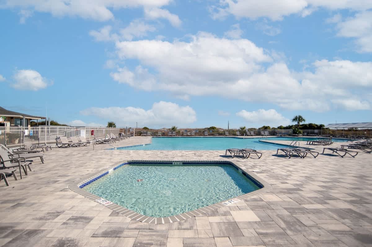 Sparkling pool and spa await your perfect day of relaxation under Florida's endless blue skies.