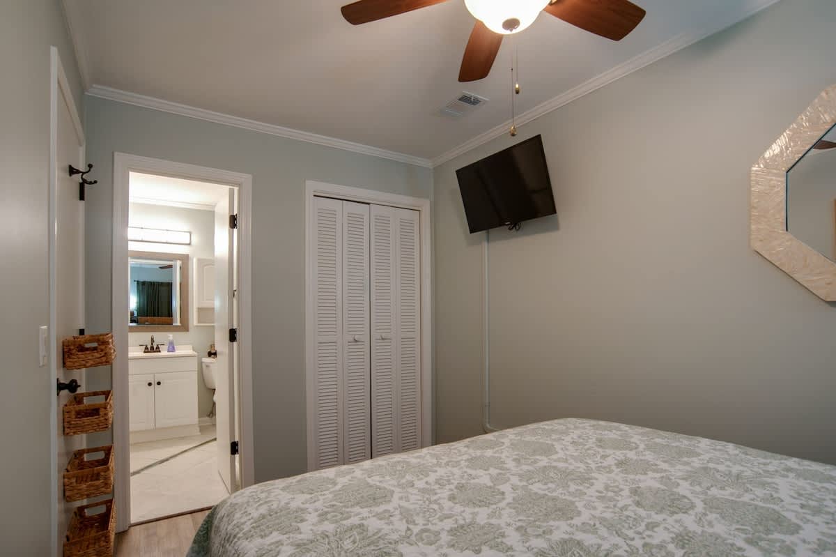 Unwind in your peaceful bedroom with soft linens, ceiling fan for comfort, and your own private ensuite just steps away.