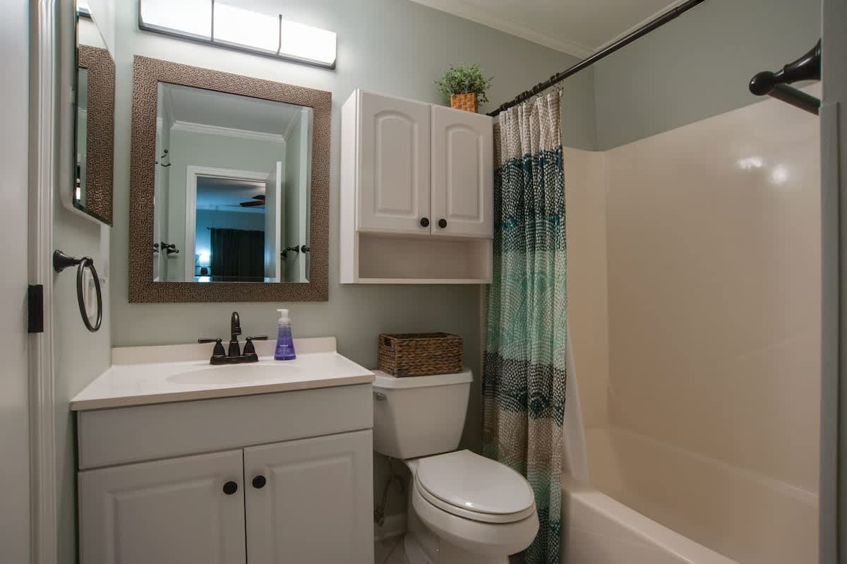 Your private bathroom features a shower-tub combo, stylish vanity, and thoughtful touches for your comfort and convenience.