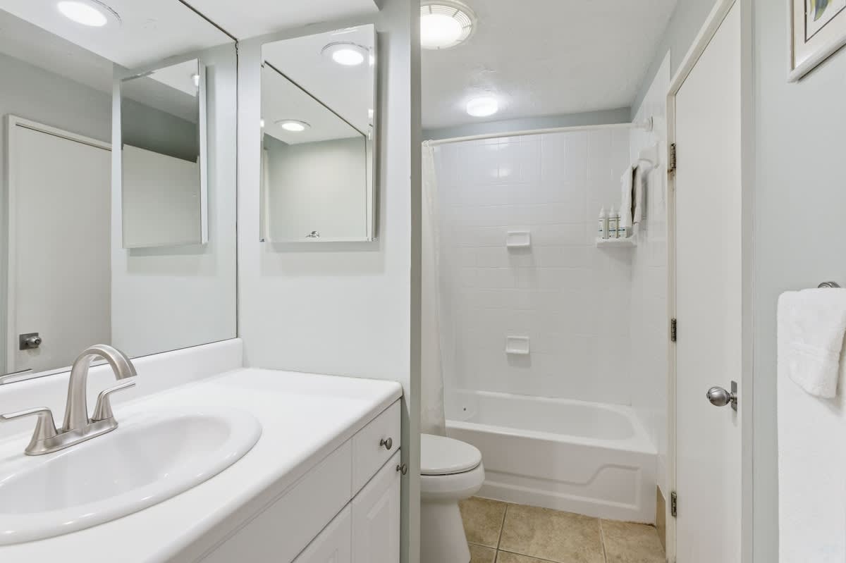Your private bathroom features a spacious tub-shower combo and vanity with plenty of counter space for your toiletries.