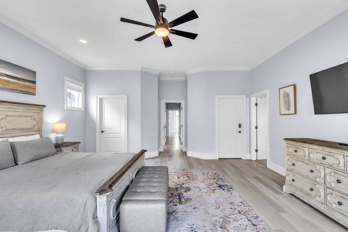 Primary Suite with King Bed, Private Balcony, and En-Suite Bathroom