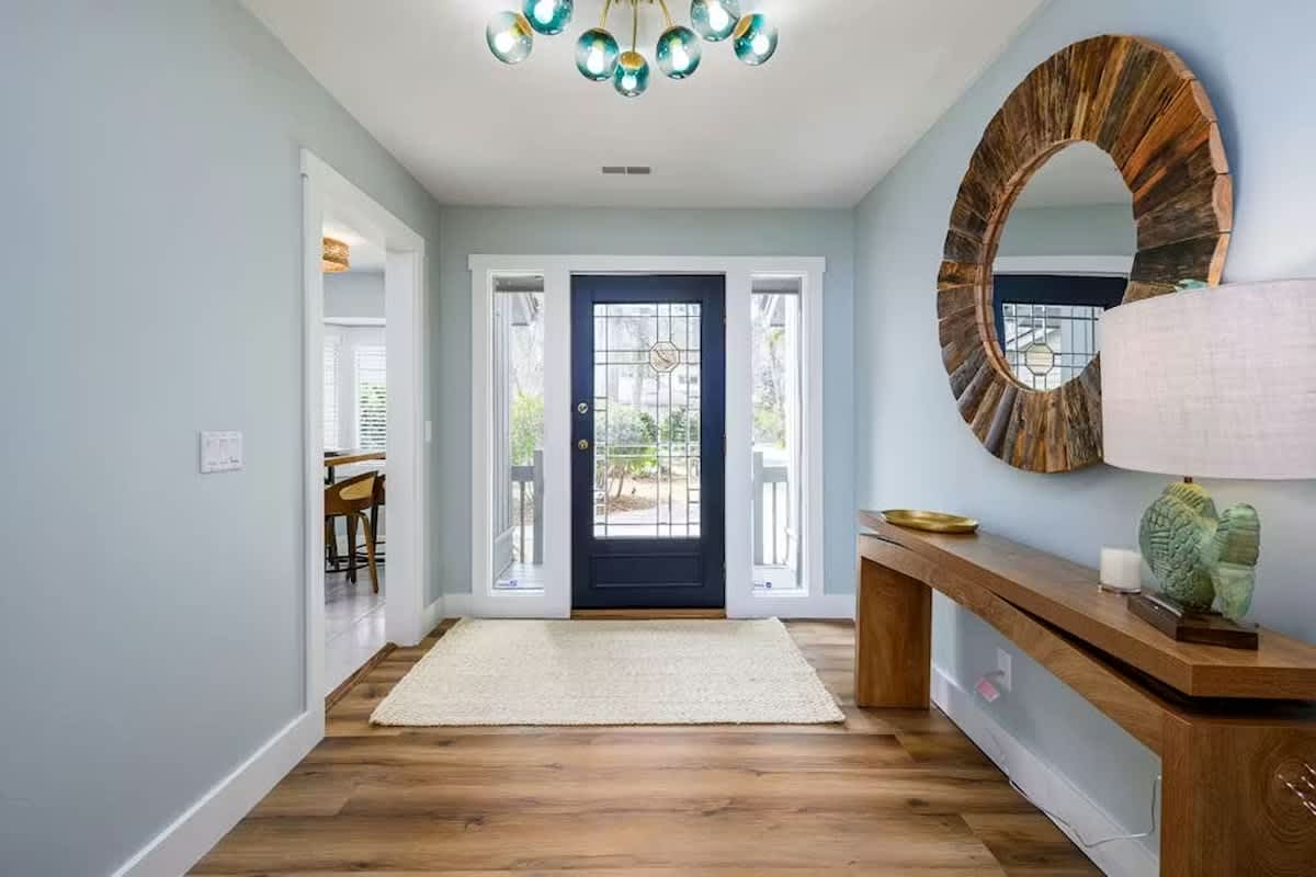 Step into your serene entryway where elegant coastal touches create an instant sense of calm and welcome.