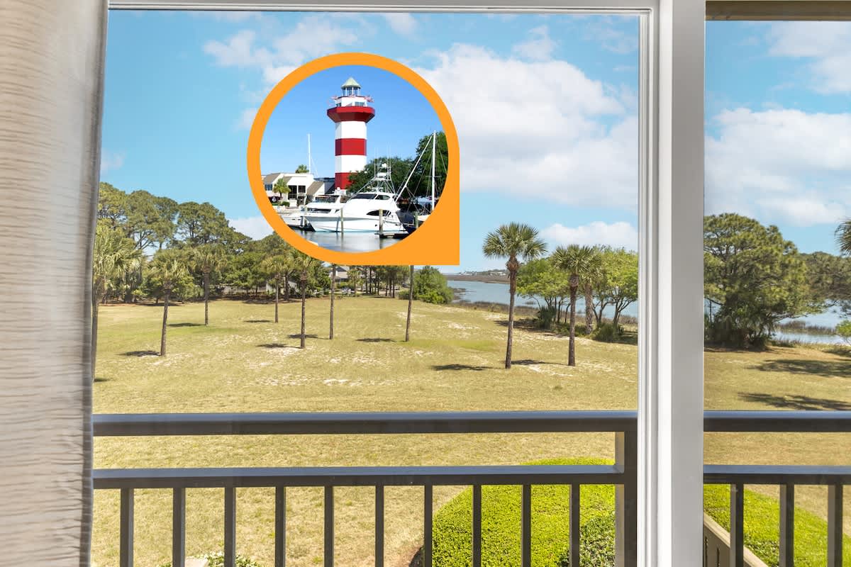 Step onto your private balcony and soak in stunning views of the iconic lighthouse and harbor marina.