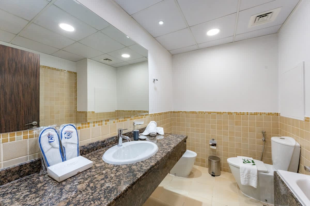 1BR Apartment with Pool & Gym in Dubai - Image 10