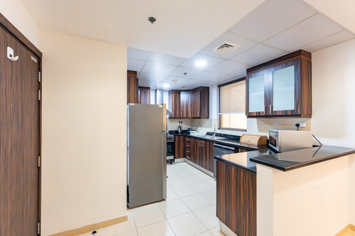 1BR Apartment with Pool & Gym in Dubai - Image 11